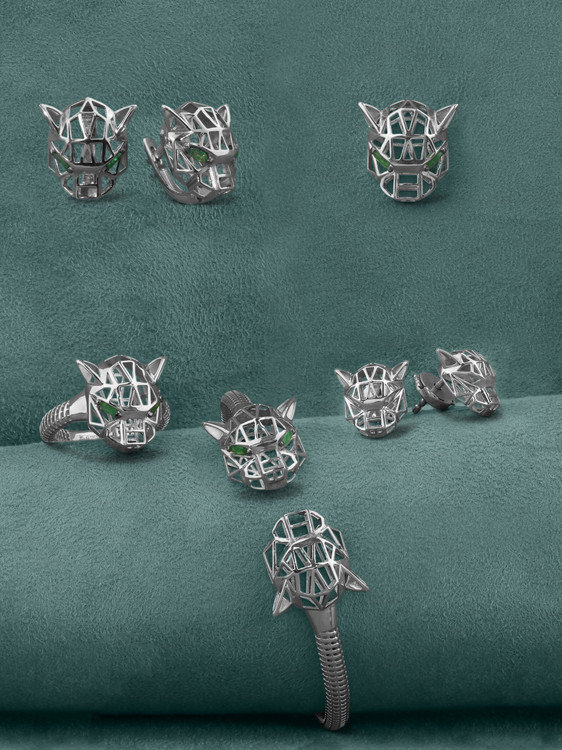 Серьги из белого золота c изумрудом