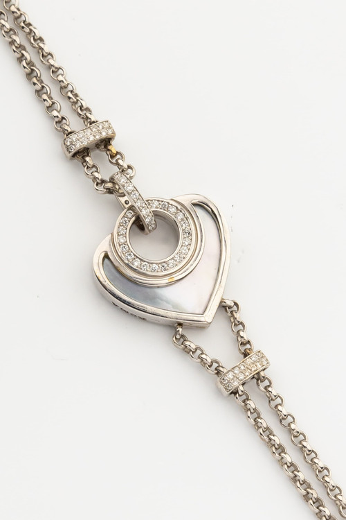 Браслет из белого золота c бриллиантами, ониксом и перламутром