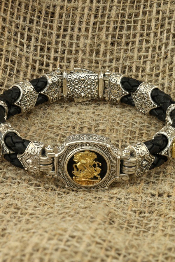 Браслет из серебра 925 пробы и золота 750 пробы c кожаным шнурком и ониксом