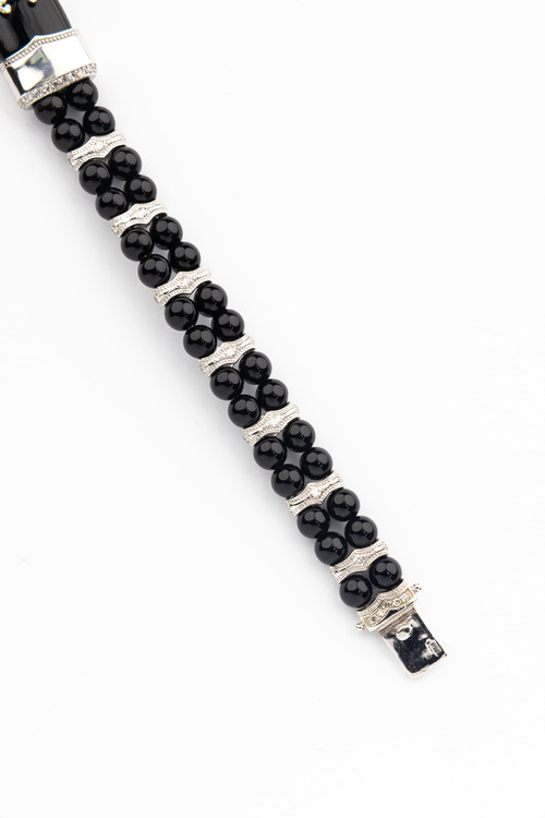 Браслет из белого золота c бриллиантами и ониксом