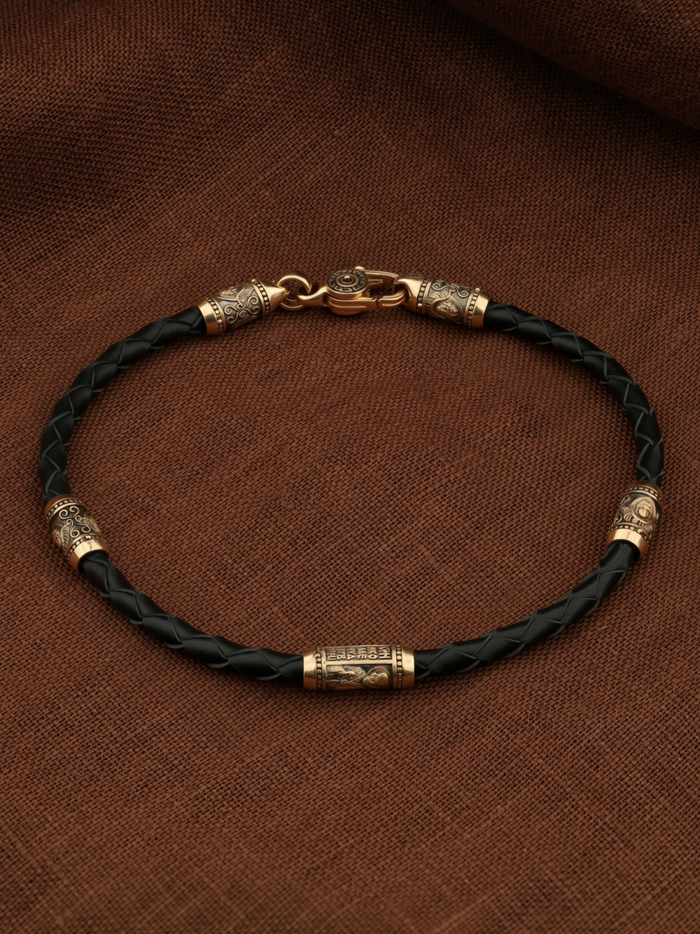 Браслет из золота c кожаным шнурком