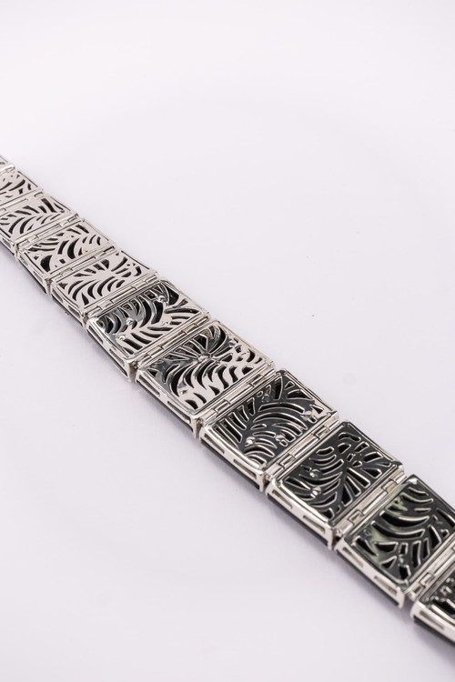 Браслет из белого золота c бриллиантами и ониксом